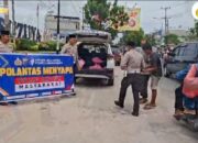 Satlantas Polres Labuhanbatu Menyapa, Berbagi Nasi Kotak Jumat Berkah di Jalan S.M Raja 